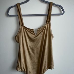 Nude boutique bodysuit